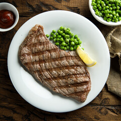 Grilled beef steak with green pea