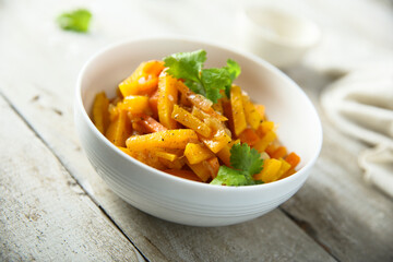 Homemade roasted pumpkin with fresh parsley