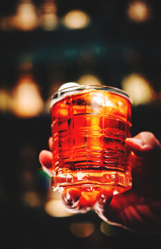 Male Hand Holding A Glass Of Coktail In A Bar