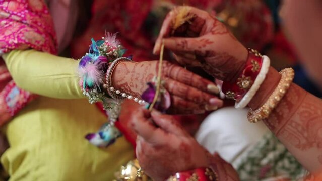 A shot of an Indian Wedding where rituals are being performed at New Delhi, India