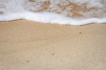 Sand beach and waves
