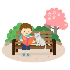 本を読む子ども　春　男の子と猫