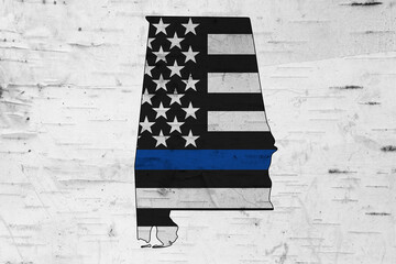 American thin blue line flag on map of Alabama