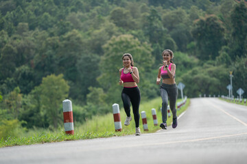 Young healthy lifestyle women running in the park.