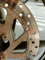 Close-up of motorcycle brakes and front wheel