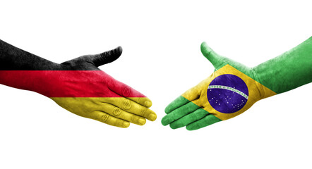 Handshake between Brazil and Germany flags painted on hands, isolated transparent image.
