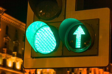 Traffic light in the city center in the evening..