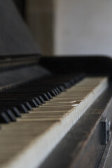 Close-up of piano keys damaged