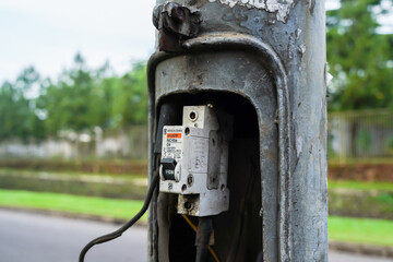 Tangerang, Indonesia, July 22, 2022 : Miniature Circuit Breaker (MCB), which is old, has worn out...