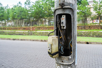 Tangerang, Indonesia, July 22, 2022 : Miniature Circuit Breaker (MCB), which is old, has worn out...