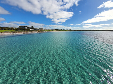 looking across water at seaside town