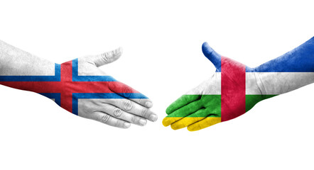 Handshake between Central African Republic and Faroe Islands flags painted on hands, isolated transparent image.