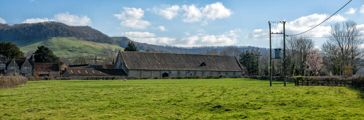 Fototapeta na wymiar 13th Century Tithe Barn at Frocester, Gloucestershire, England, United Kingdom