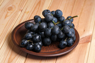 Sweet ripe black unwashed grapes