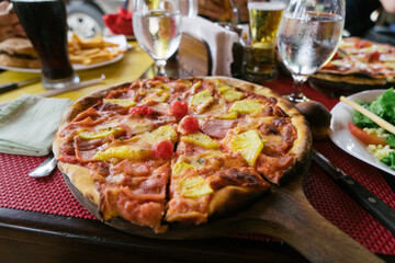 Pizza plate on a table during lunch in a restaurant.