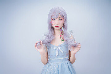 A girl with petals on her body