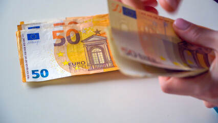 fifty euro, ten euro, twenty euro banknotes. Inflation. Expenses and income. Finance and savings....