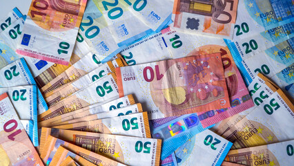 fifty euro, ten euro, twenty euro banknotes. Inflation. Expenses and income. Finance and savings. Money counting. Cash. A crisis. Business. Central bank. Euro Union. Economy. Salary. Currency. War gas