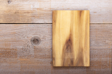 Chopping kitchen boards on a wooden background. Top view flat lay.