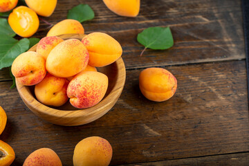 Delicious ripe apricots and leaves