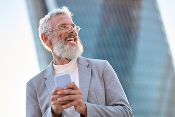 Happy older mature stylish professional business man, smiling senior 60 years old businessman...