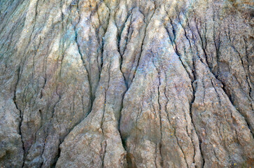 Coal canyon texture. Coal mountain close-up. Brown mountain texture. Rock background