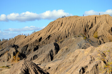 Stunning horizontal mountain landscape with a picturesque coal canyon. Incredible mountain view on a sunny day. High mountain peak. Unique mountain background