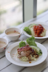 steamed rice topped with chicken 