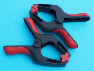 Obraz premium Flexible plastic chuck jaws. Carpenters clamp set. Clamps for clamping and securing workpieces