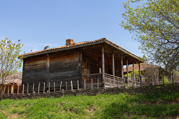 Fototapeta na wymiar Traditional Georgian historic wooden house on top of the hill