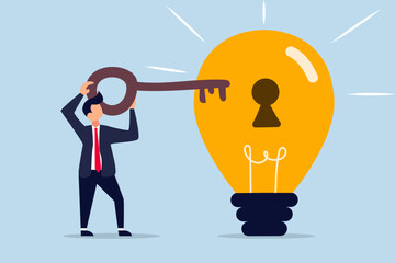 Unlock new business idea, smart businessman holding golden key about to insert into key hold on lightbulb idea lamp