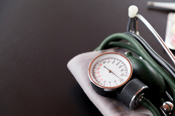 Medical stethoscope on a table. Medical care. Stethoscope concept. blood pressure measurement concept.