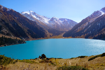 Fototapeta na wymiar Amazing mountain lake with turquoise water, Big Almaty lake. 