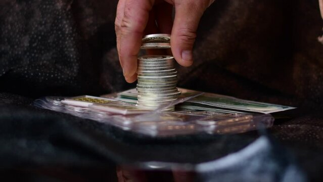 Silver coins stacked, home savings