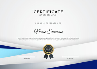 Fototapeta premium Certificate of achievement blue template design with gold badge and border for business, award, honor and school