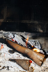 Logs burning on the barbecue