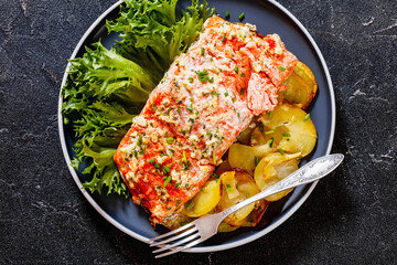 salmon with potato and tarragon sour cream sauce