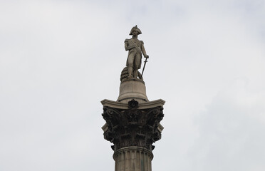 The statue of Admiral Nelson in Trafalgar Square, London - obrazy, fototapety, plakaty