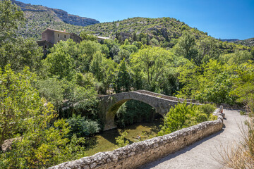 Fototapeta na wymiar Old bridge at Rocher de la Vierge, Cirque de Navacelles, France