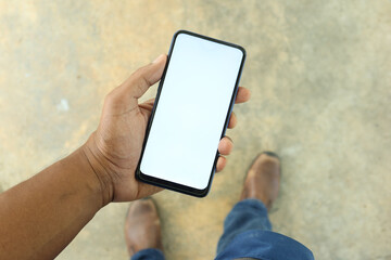 POV of young man hand using smart phone with white screen 