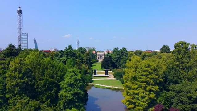 Gate Sempione Porta Sempione city gate to Lombardy in the fall. Arch of Peace. Arco della pace. sunny evening in milan city park aerial panorama 4k italy milano city triumphal arch. Sculptures 