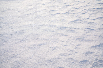 Snowy white background, the ground in a frosty winter day. Clear.