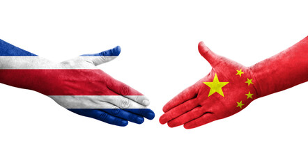 Handshake between China and Costa Rica flags painted on hands, isolated transparent image.