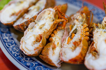 Seafood steamed lobster in vegetable decoration