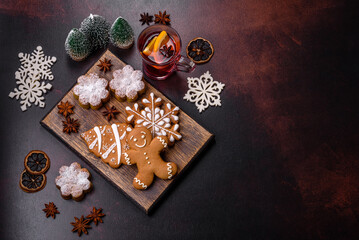 Hot mulled wine with a slice of orange, with cinnamon, cloves and other spices