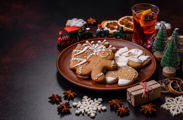 Hot mulled wine with a slice of orange, with cinnamon, cloves and other spices