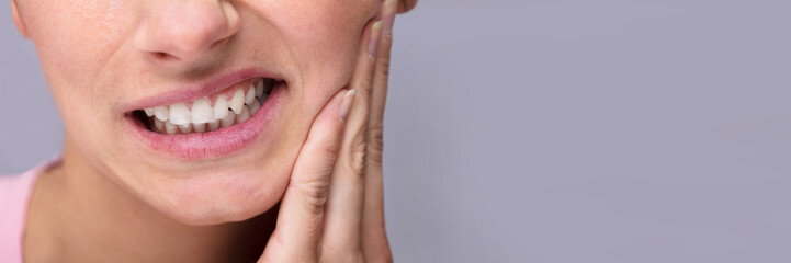 Young Woman Suffering From Toothache