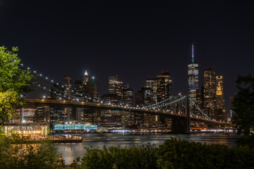 Fototapeta na wymiar night time NYC Skyline + Bridge