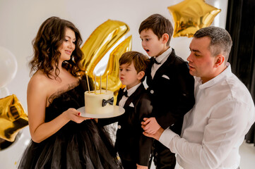 Birthday cake. boys blowing candle