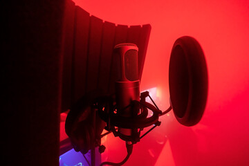 recording studio microphone and headphones